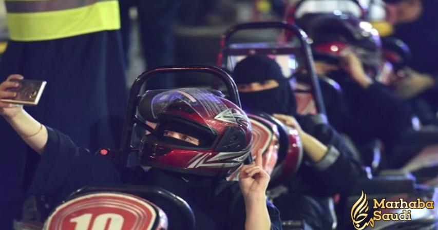 Saudi women attend a go-cart test drive during a driving workshop for women
