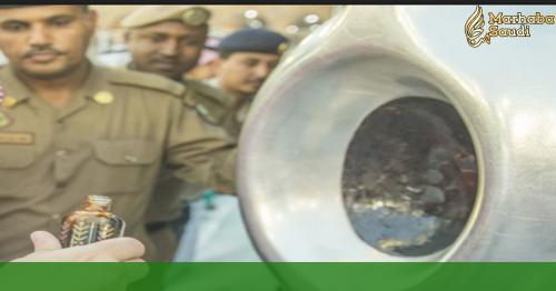 Who are the 24 men that guard the sacred Black Stone in Mecca?